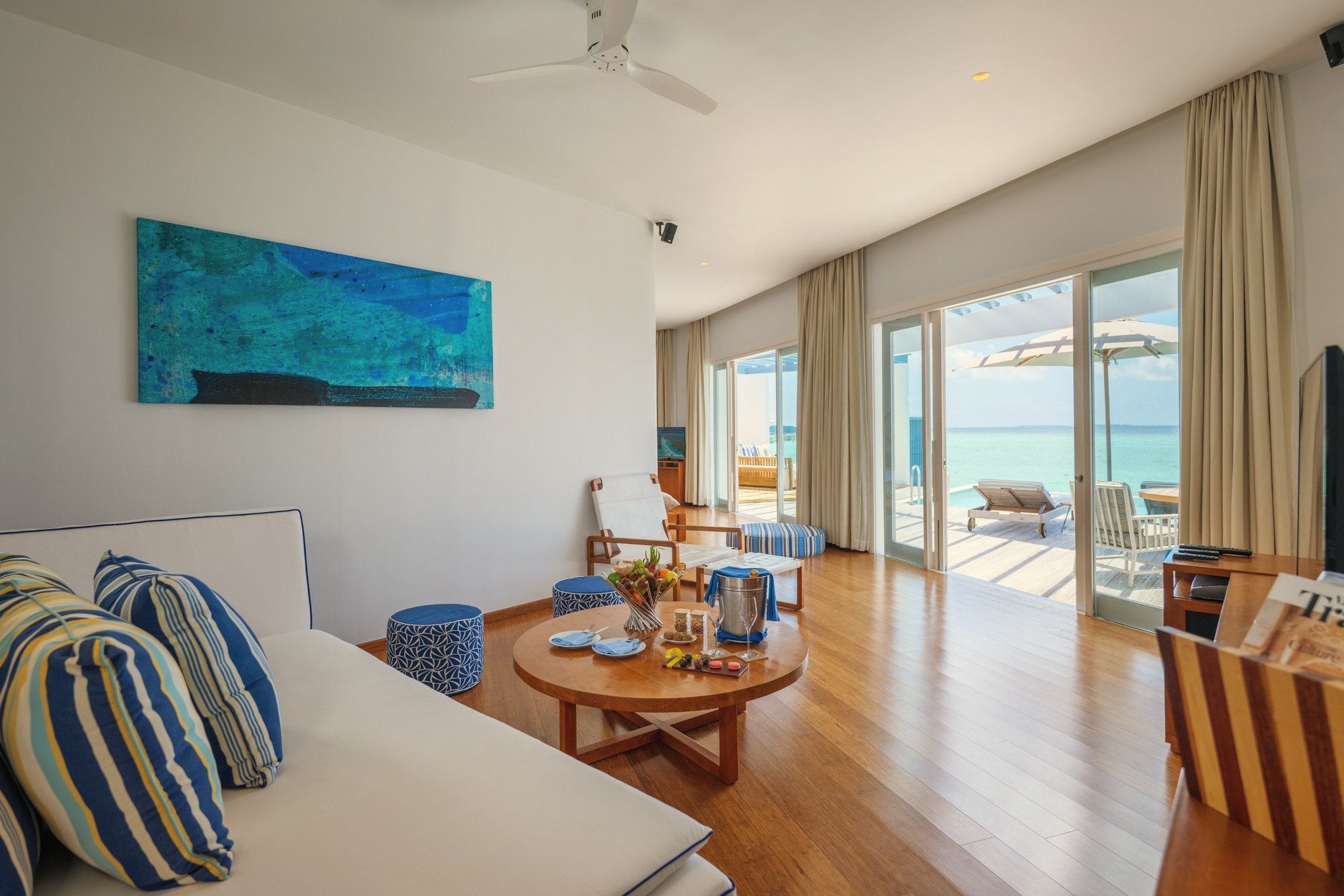 The interior of a villa at Amilla. Residential in scale, with the island-homes concept evident in the proportions and the materials.