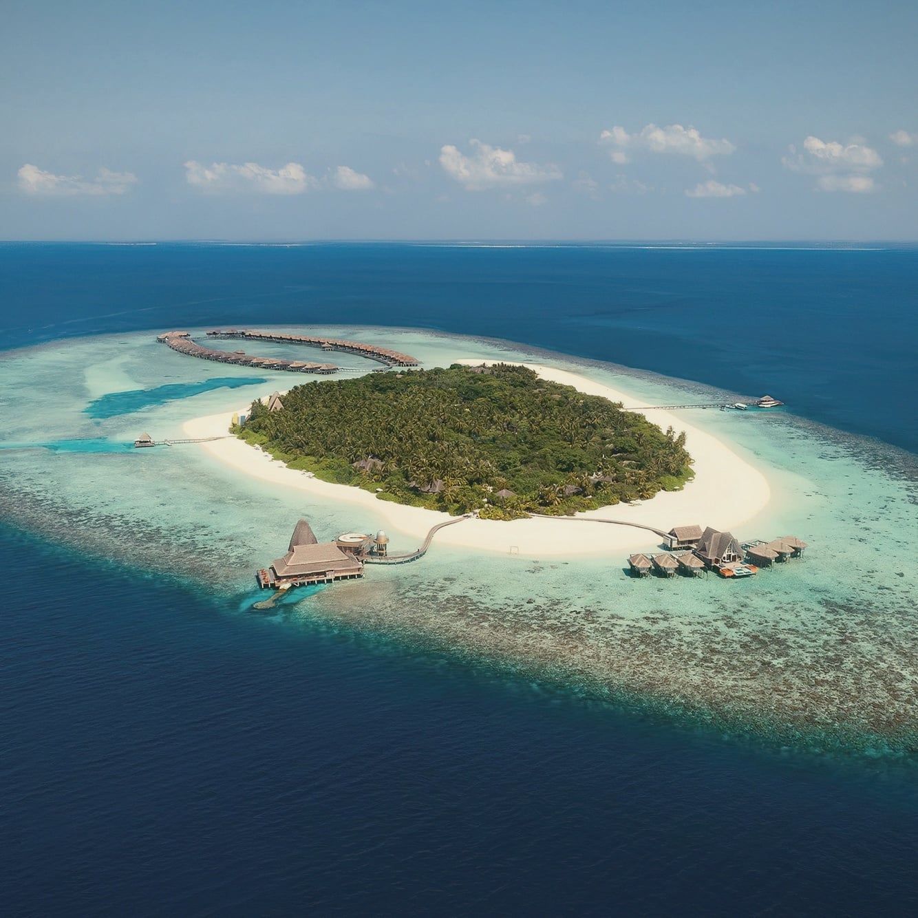 Kihavah Huravalhi from above. Anantara's island in Baa Atoll, within easy seaplane range of the manta-season activity.