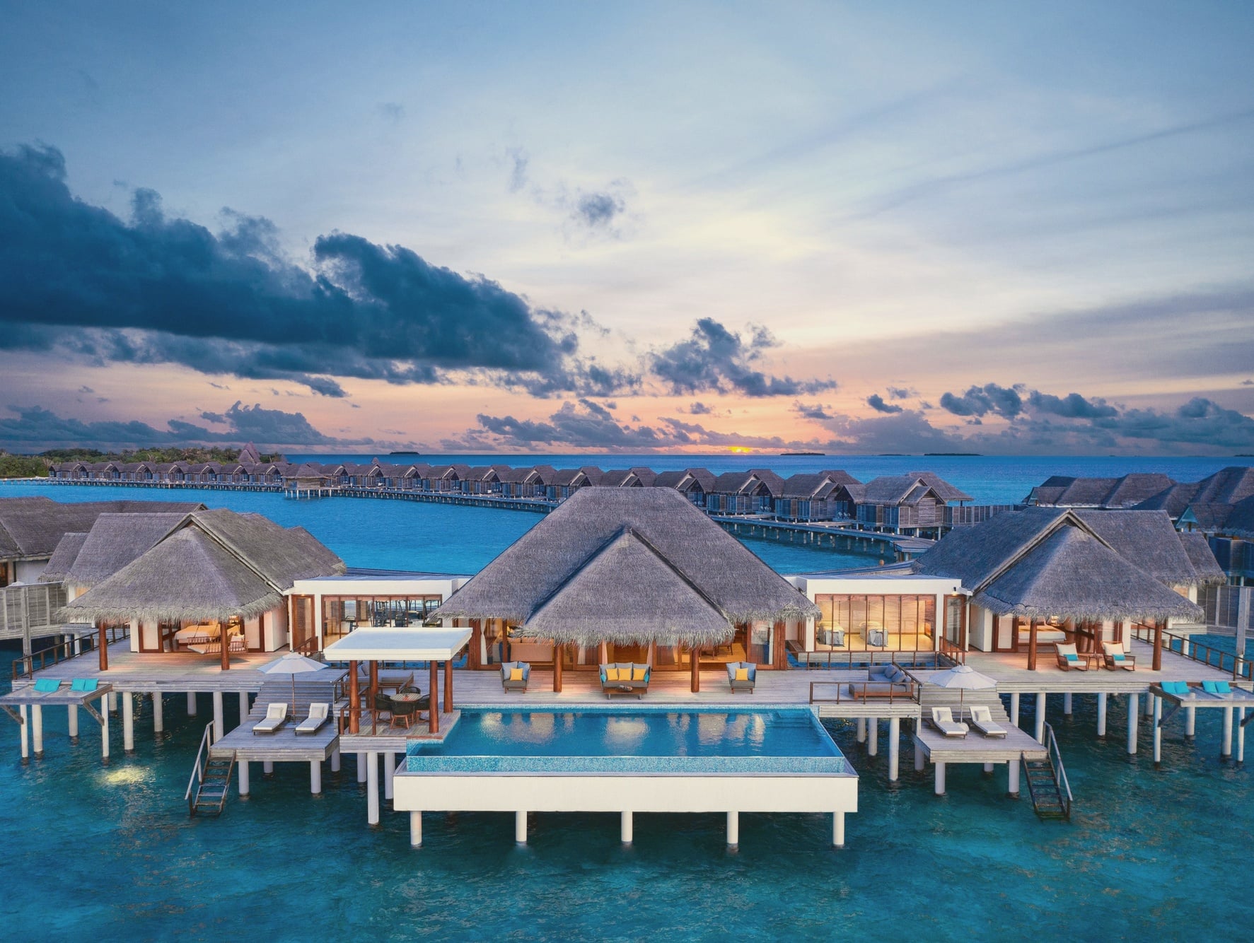 Spectre villa pool. The upgraded overwater configuration with private pool extending over the lagoon.