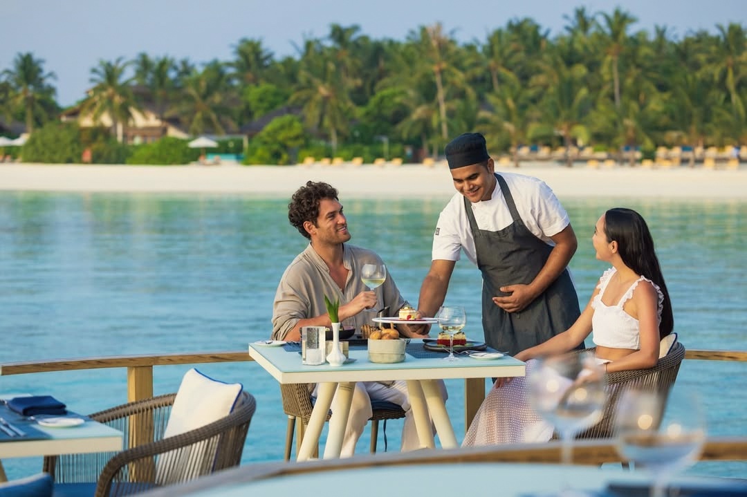 Dining at the water's edge. The all-inclusive programme means the table is set without a menu of supplements to navigate.