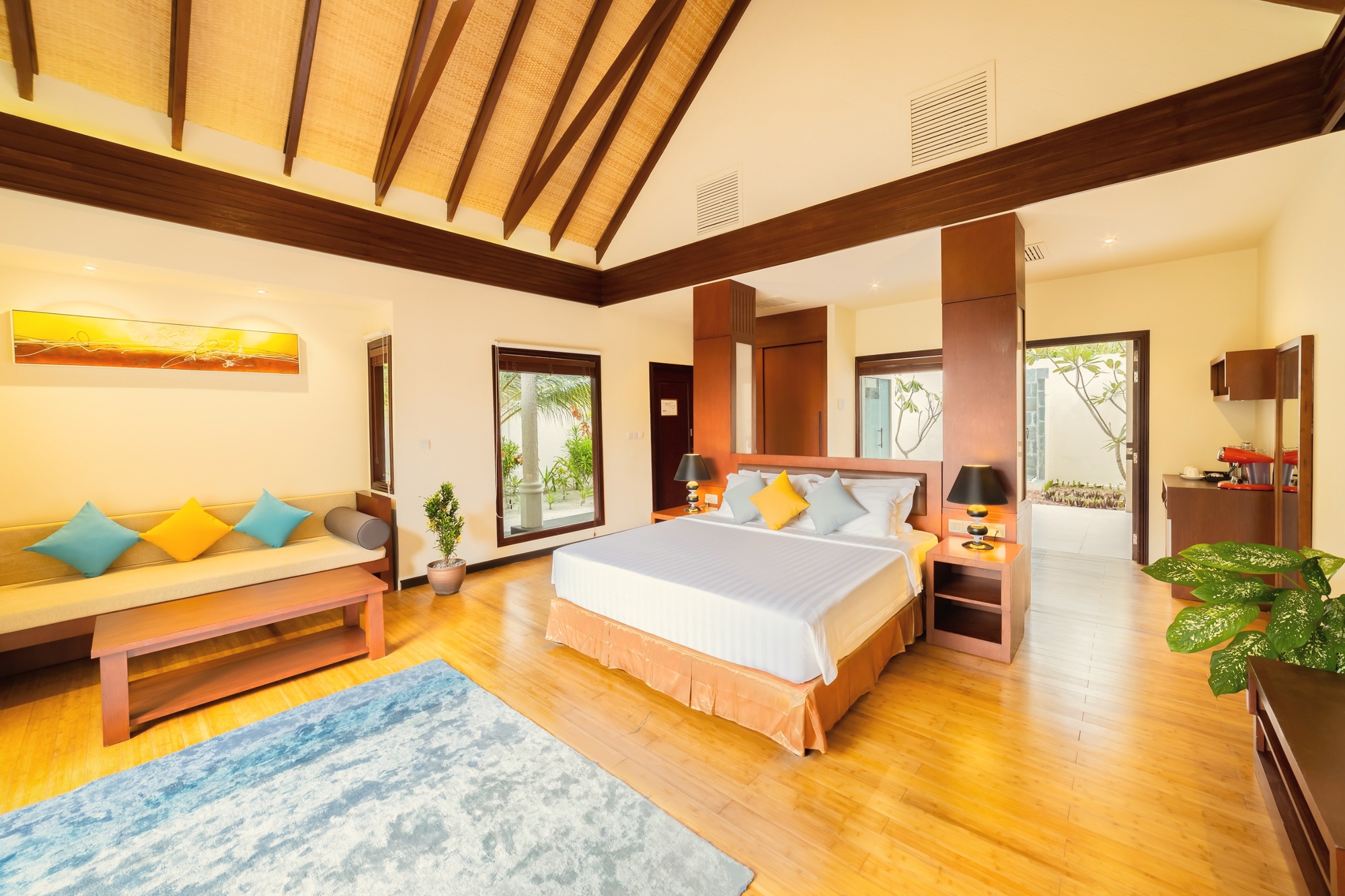 The interior of a beach villa at 125 square metres. The configuration is generous, with direct sand access from the terrace.