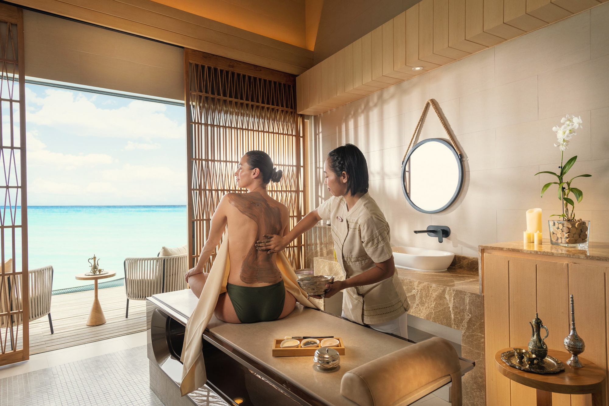The spa treatment room. A full-programme facility with body and facial therapies, positioned at the quieter end of the island.