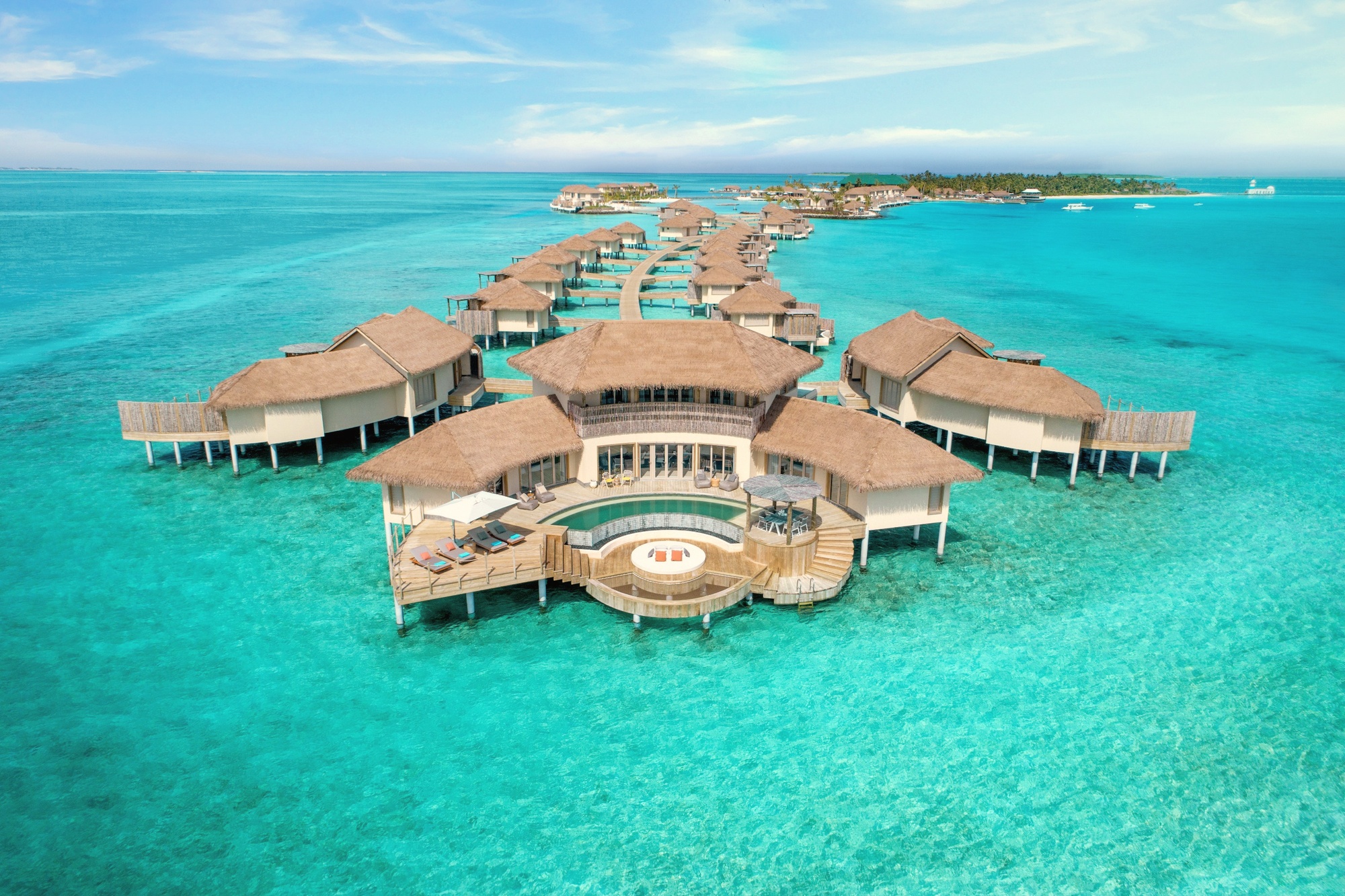 Maamunagau from above. The private island sits within the Raa Atoll UNESCO Biosphere Reserve, surrounded by one of the most productive reef systems in the archipelago.