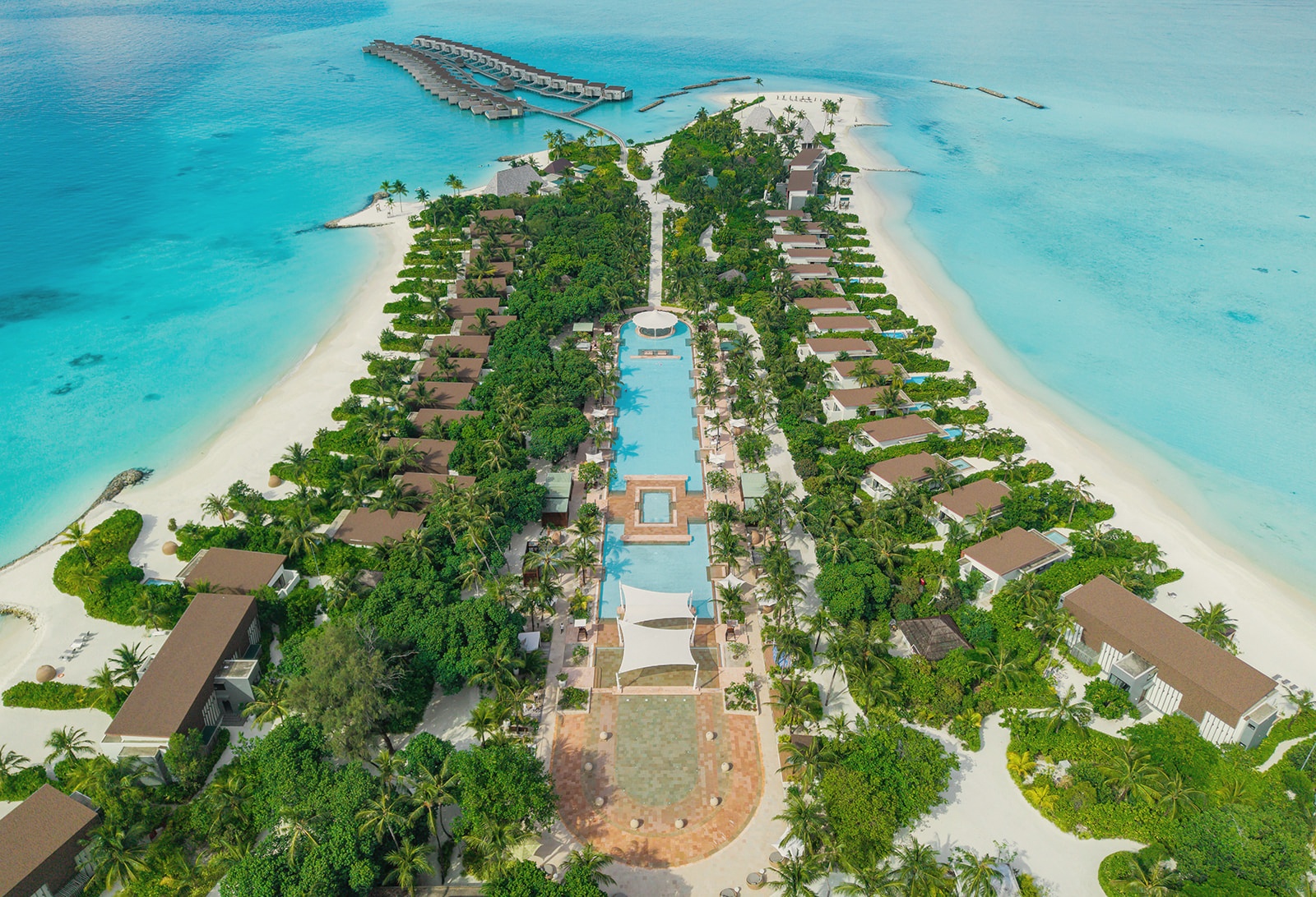 Kuda Villingili from above. The resort occupies its own private island in North Malé Atoll, the lagoon visible on all sides.