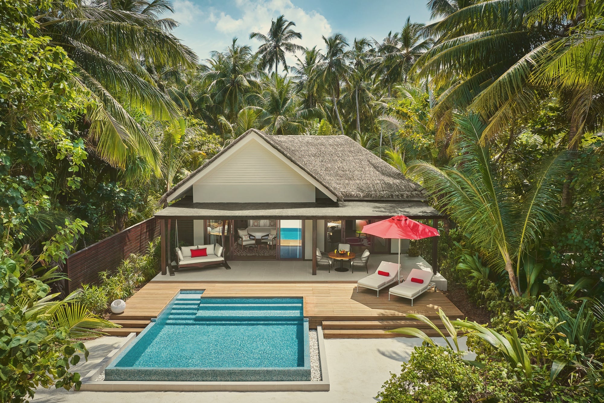 Villa pool deck. Niyama's family-suitable pool footprint, generous for the price band.