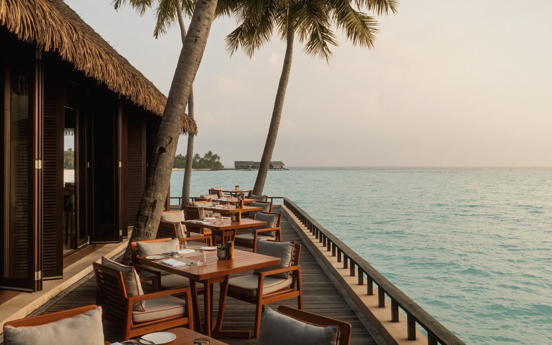 The Reef Club. The property's signature beach-front restaurant, positioned on one of the twelve bays.