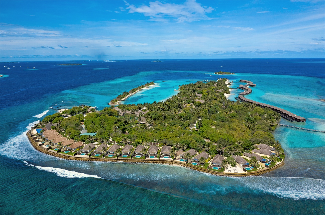 Furanafushi Island from above. The resort occupies a generous footprint in North Malé Atoll, with the spa island visible as a separate landmass to the south.