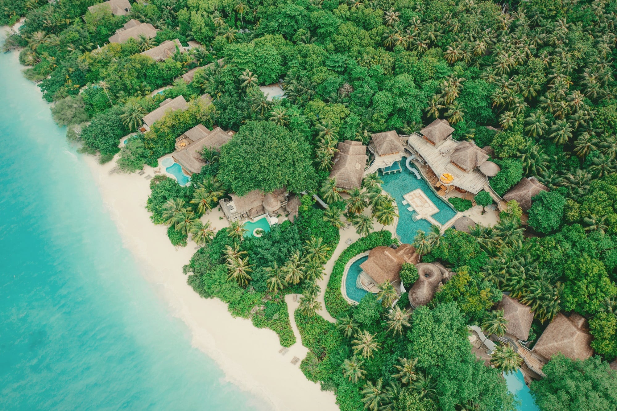Kunfunadhoo Island from above. Soneva Fushi occupies the largest island in the Baa Atoll resort cluster, supporting the property's signature scale.