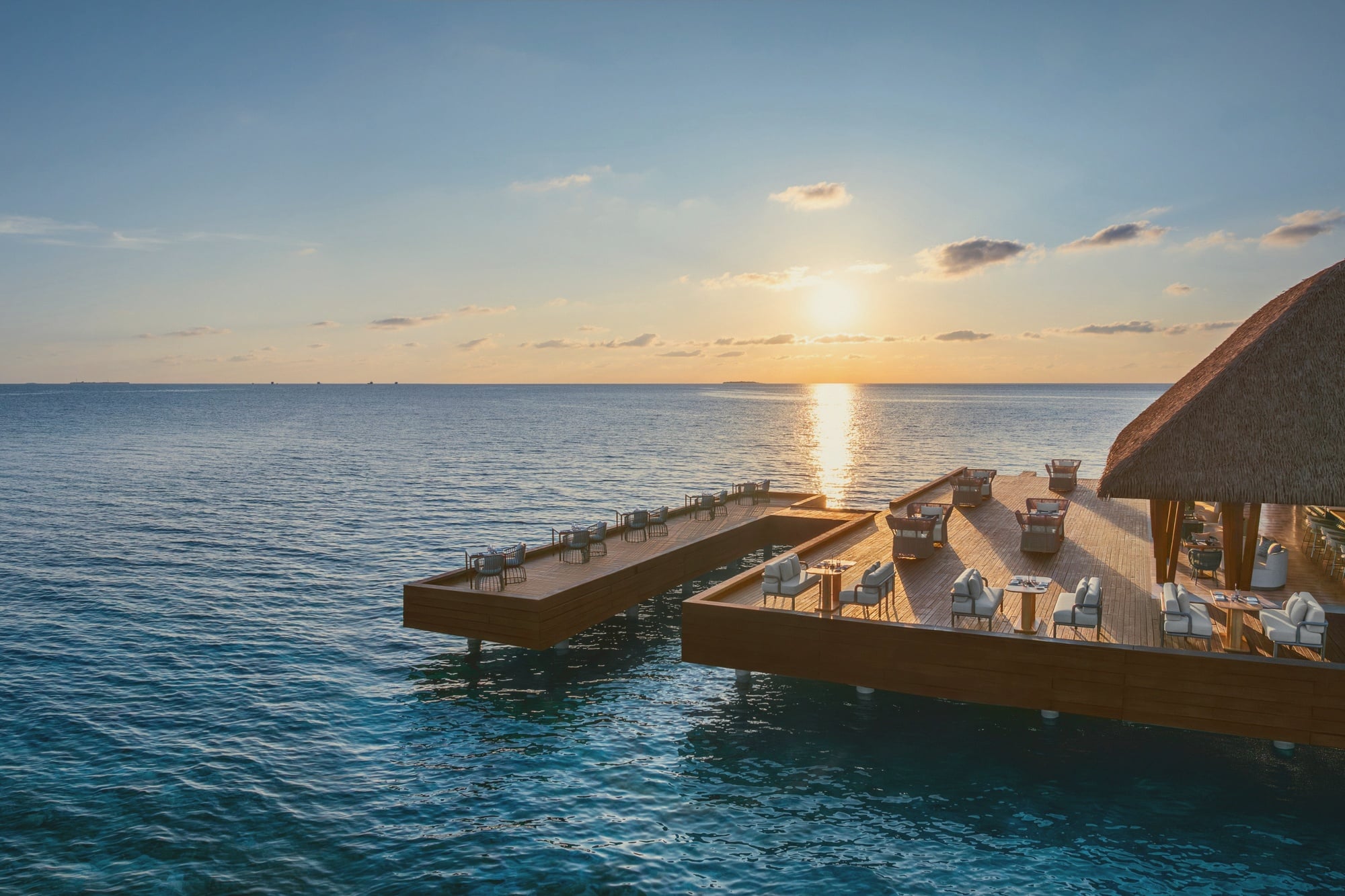Fish. The over-water restaurant, the property's signature dining venue with the W brand vocabulary throughout.