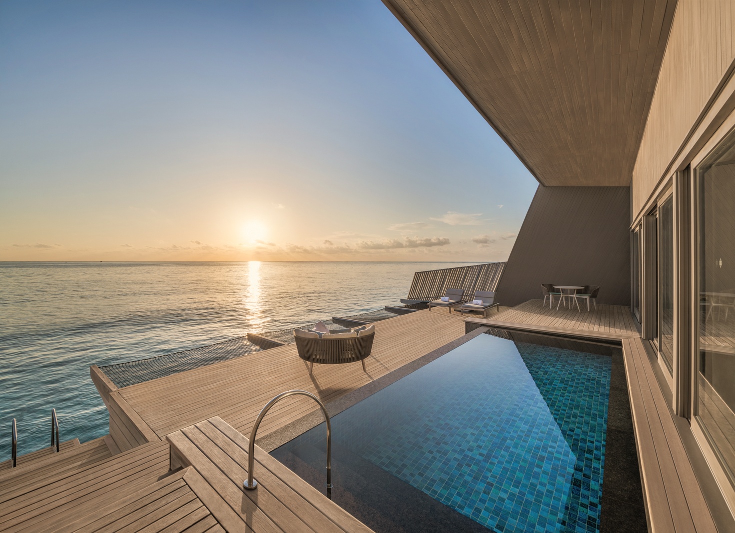 Sunset Overwater Pool Villa. St. Regis Maldives Vommuli Resort